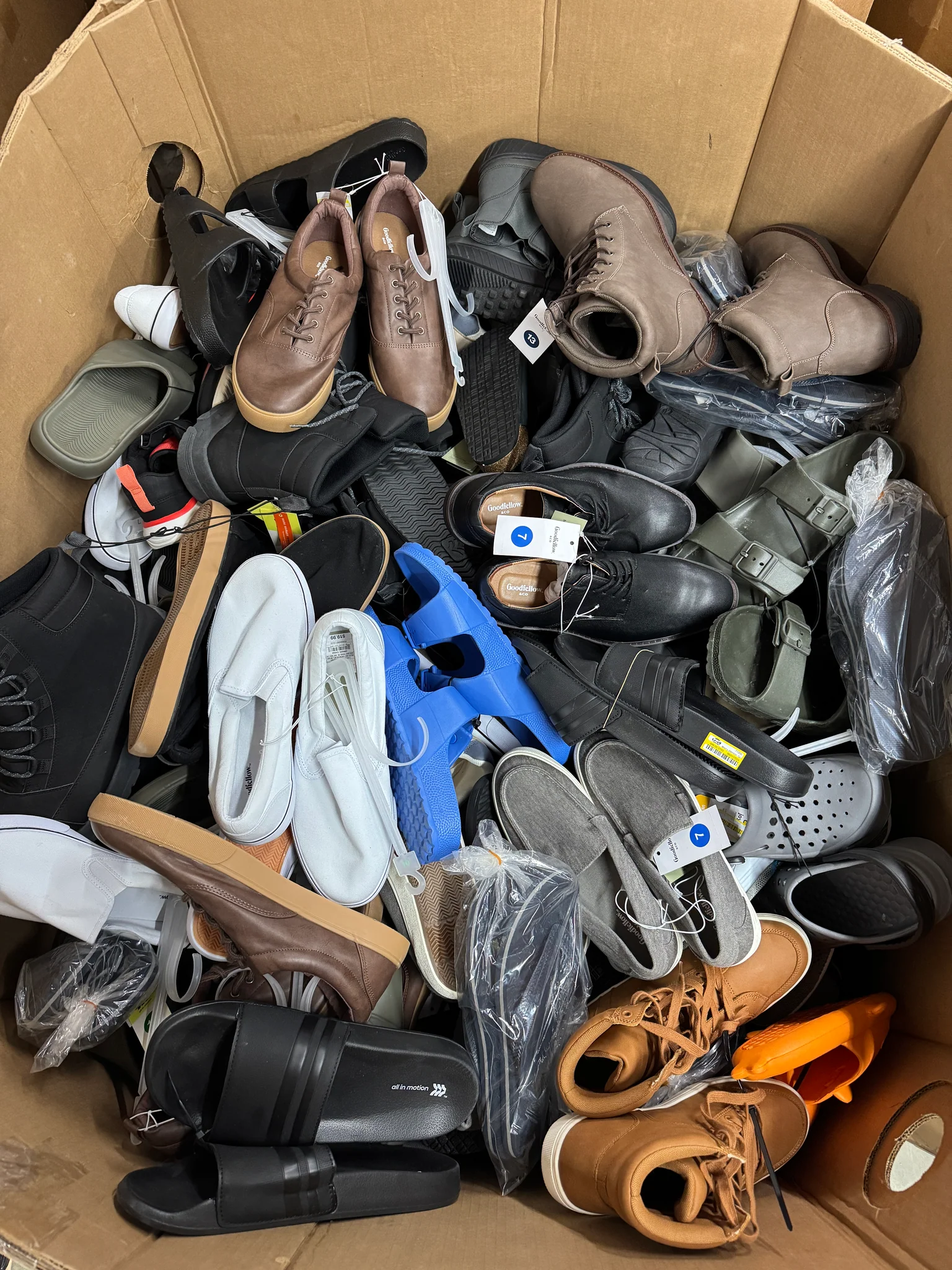 Target Men's Shoes Wholesale Pallet with 200 pairs of brand-new men's sneakers, boots, dress shoes, sandals, and all-season footwear