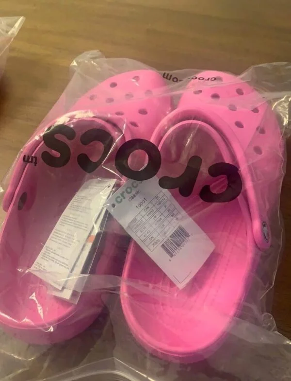 Crocs Pallet with 100 authentic brand-new pairs of Crocs clogs, sandals, slides, boots, and kids' footwear for wholesale resale
