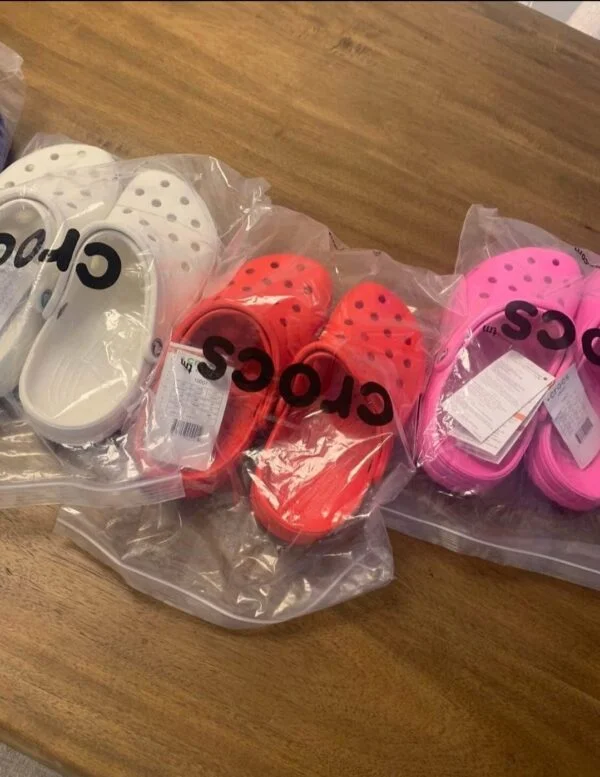 Crocs Pallet with 100 authentic brand-new pairs of Crocs clogs, sandals, slides, boots, and kids' footwear for wholesale resale