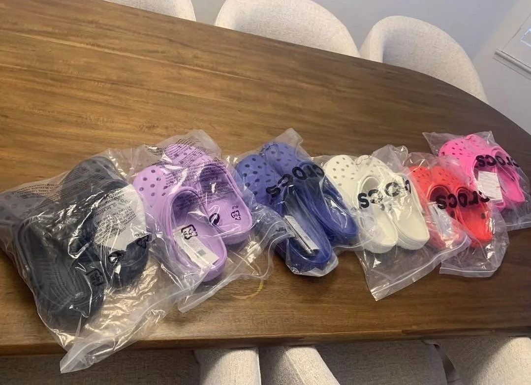 Crocs Pallet with 100 authentic brand-new pairs of Crocs clogs, sandals, slides, boots, and kids' footwear for wholesale resale