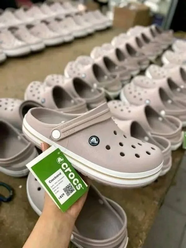 Crocs Pallet with 100 authentic brand-new pairs of Crocs clogs, sandals, slides, boots, and kids' footwear for wholesale resale