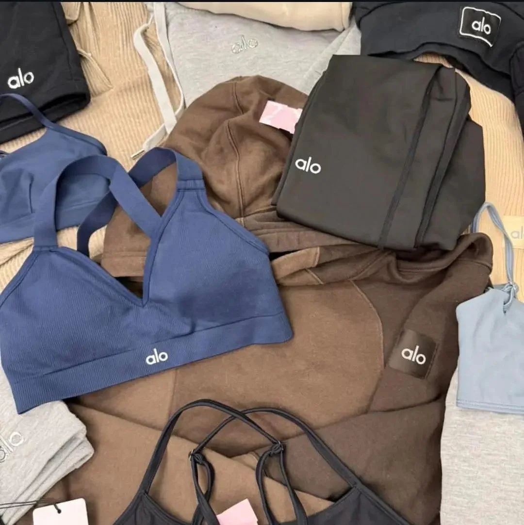 Alo Yoga Clothing Pallet with wholesale leggings, sports bras, hoodies, premium yoga apparel, activewear, and branded clothing liquidation inventory