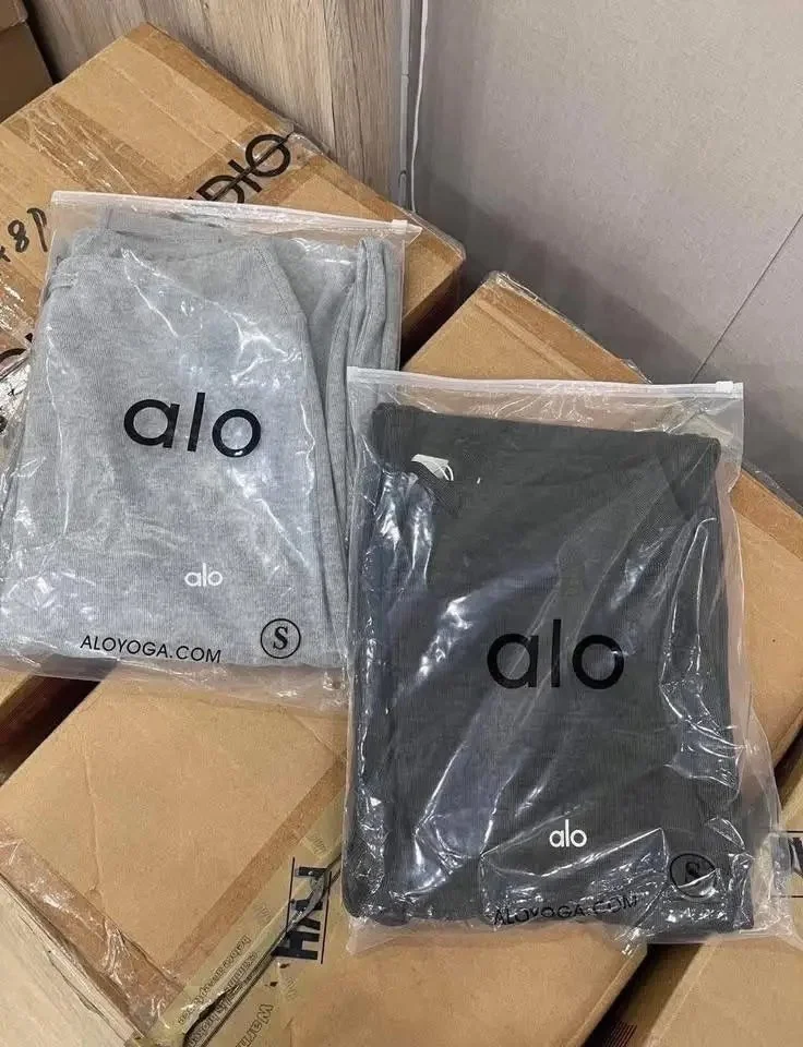 Alo Yoga Clothing Pallet with 380 to 400 brand-new activewear pieces including leggings, sports bras, hoodies, jackets, and premium athleisure apparel