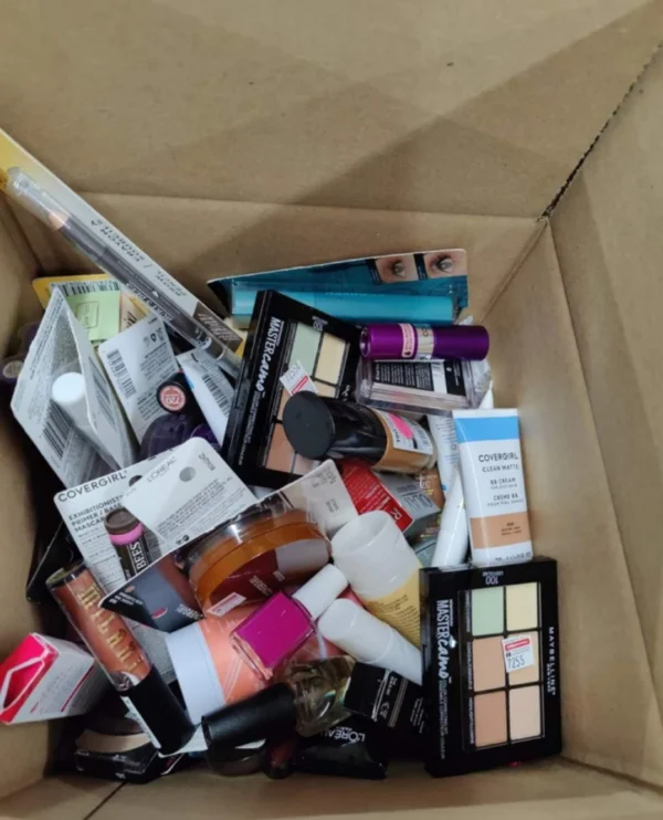 Makeup Mystery Box Pallets with 5 wholesale beauty mystery boxes containing assorted cosmetics, skincare products, makeup brushes, and beauty accessories