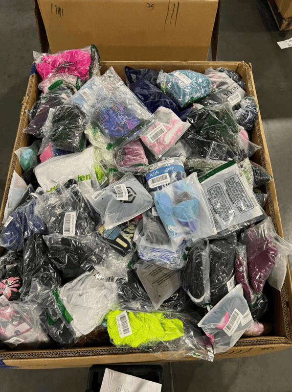 Amazon LPN Apparel Truckload with 24 pallets of mixed women's, men's, and children's clothing individually packaged in poly bags