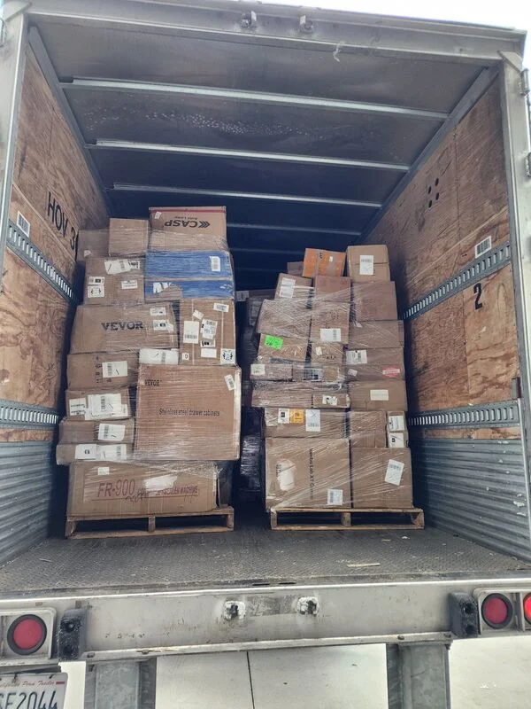Ecom Undeliverables Mediums Truckload with 26 wholesale pallets of mixed undeliverable eCommerce merchandise including electronics, home goods, tools, toys, apparel, and household products for resale.