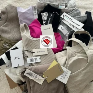 Lululemon Liquidation Pallets featuring premium activewear, leggings, sports bras, hoodies, jackets, and athleisure apparel for wholesale resale