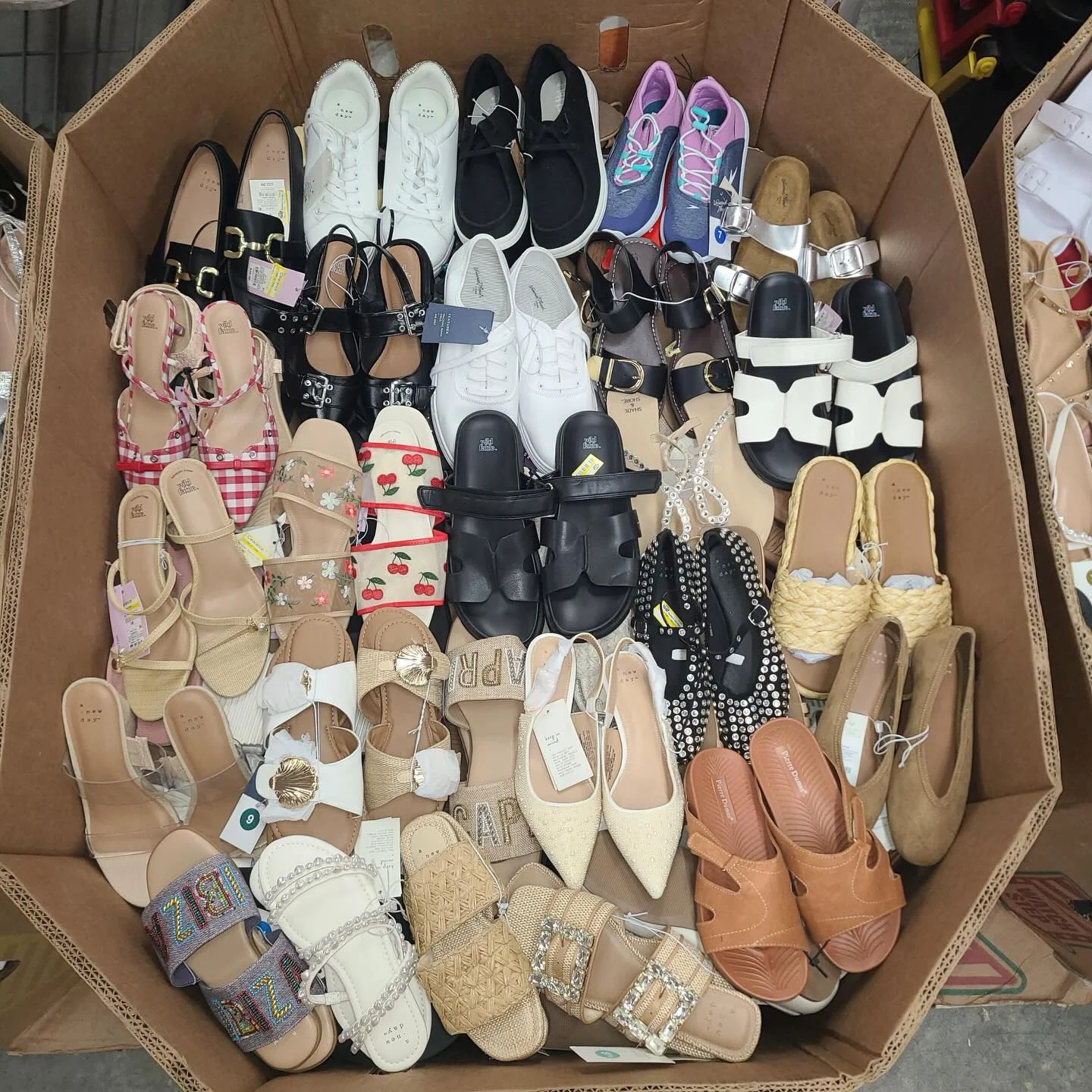 Target Women's Shoes Pallet featuring approximately 200 pairs with 95% brand-new inventory including sneakers, sandals, boots, flats, heels, athletic shoes, and casual footwear for wholesale resale.