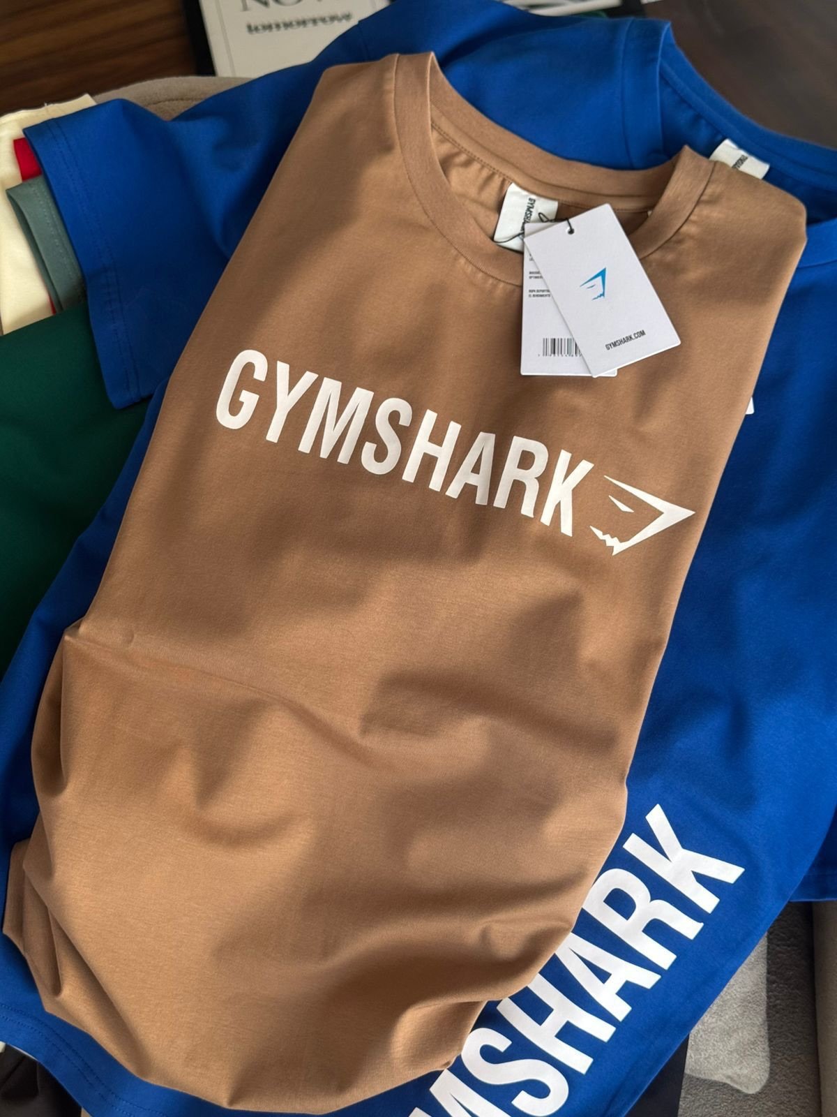 Gymshark Clothing Pallets with 450 to 500 premium activewear pieces including leggings, sports bras, hoodies, joggers, shorts, and fitness apparel for wholesale resale
