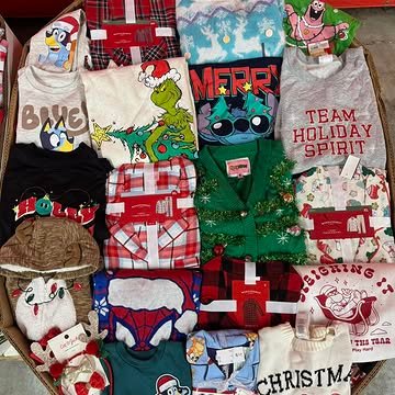 Target Christmas Clothing Pallets containing 550–650 pieces of holiday pajamas, sweaters, T-shirts, Christmas accessories, and pet apparel for wholesale resale.