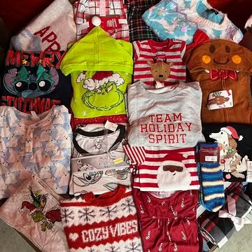 Target Christmas Clothing Pallets containing 550–650 pieces of holiday pajamas, sweaters, T-shirts, Christmas accessories, and pet apparel for wholesale resale.