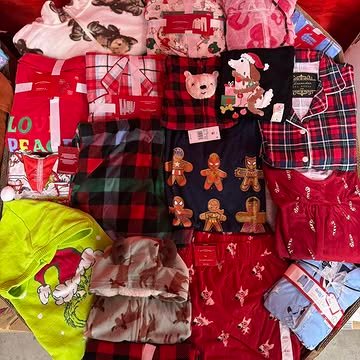 Target Christmas Clothing Pallets containing 550–650 pieces of holiday pajamas, sweaters, T-shirts, Christmas accessories, and pet apparel for wholesale resale.