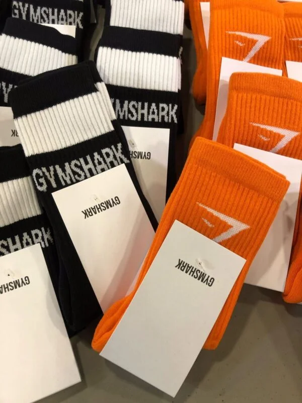 Gymshark Clothing Pallets with 450 to 500 premium activewear pieces including leggings, sports bras, hoodies, joggers, shorts, and fitness apparel for wholesale resale